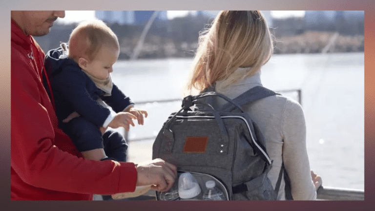 Dad mom and baby with diaper bag backpack